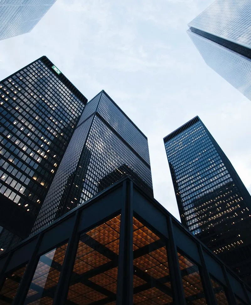 Glass office towers seen from below